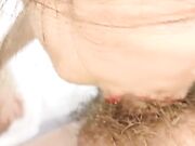 酒店黑色露沟包臀裙黑丝高跟蹲着嗦弄大屌